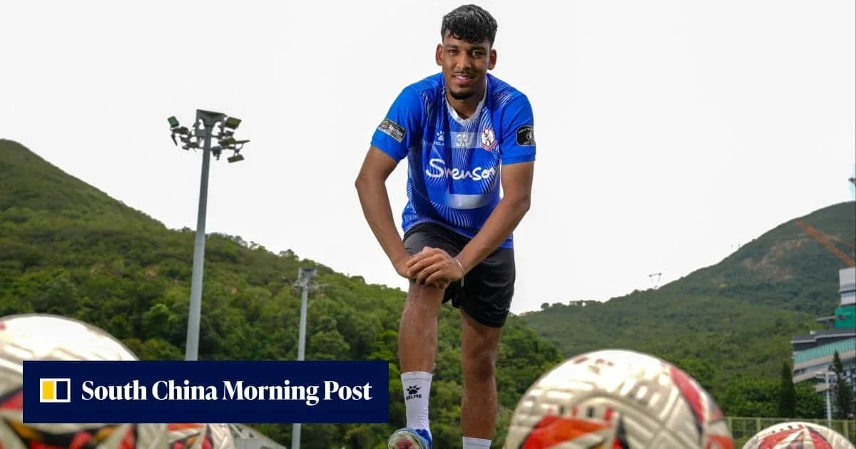 Football player posing with training balls outdoors Football player posing with training balls outdoors
