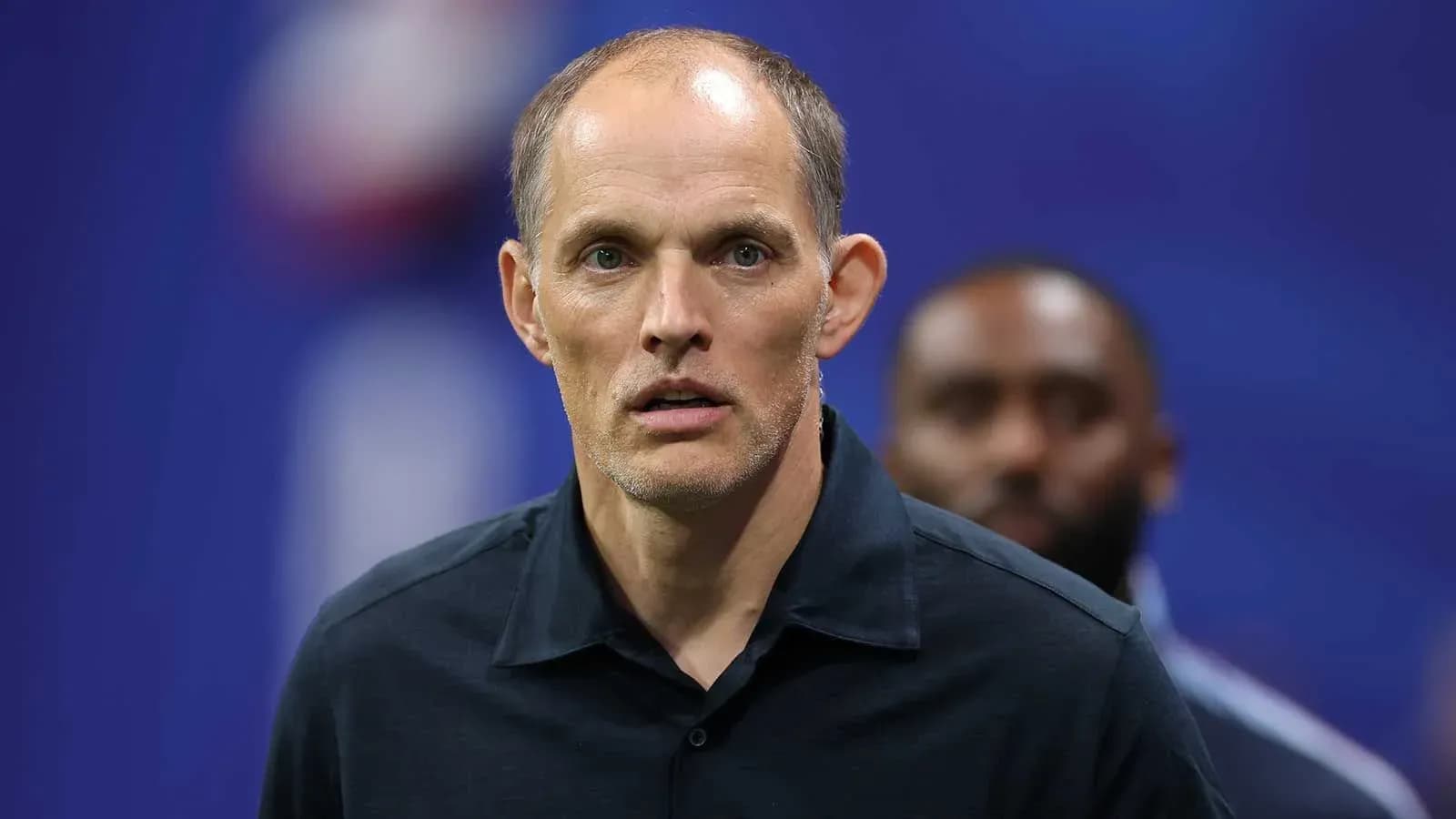 Coach focused during a team event or session Coach focused during a team event or session