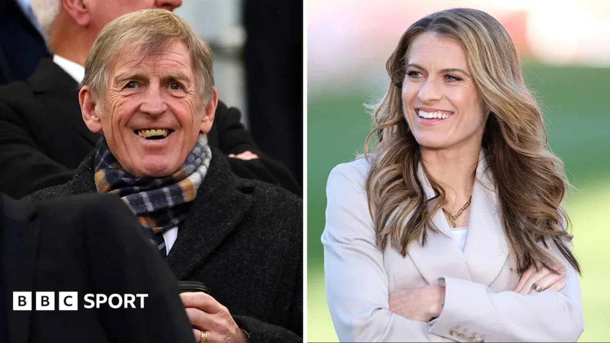 Two sports commentators smiling during an event Two sports commentators smiling during an event