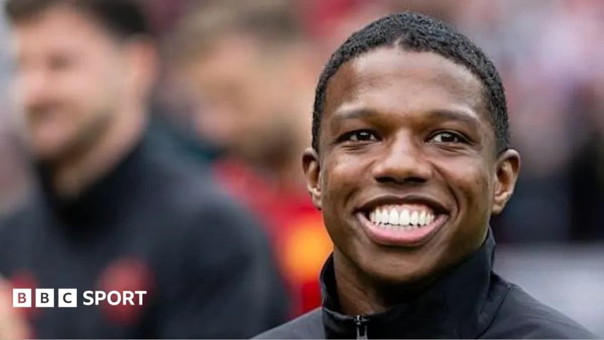 Smiling player during pre-match warm-up Smiling player during pre-match warm-up