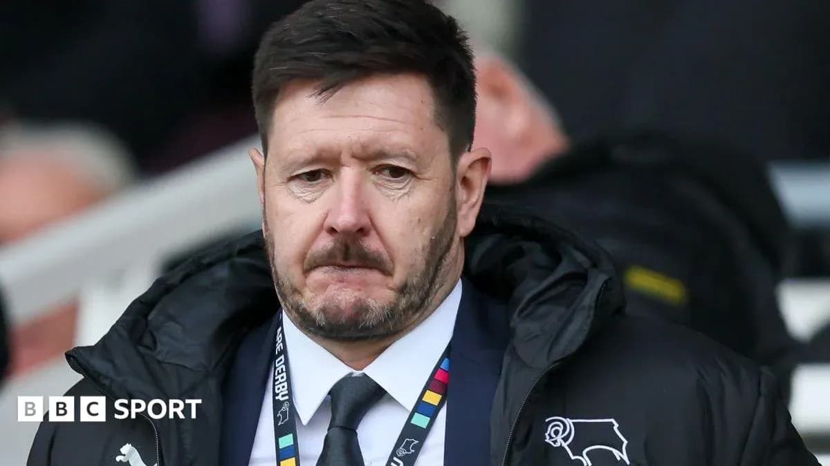 Manager looking serious on the sidelines during match Manager looking serious on the sidelines during match