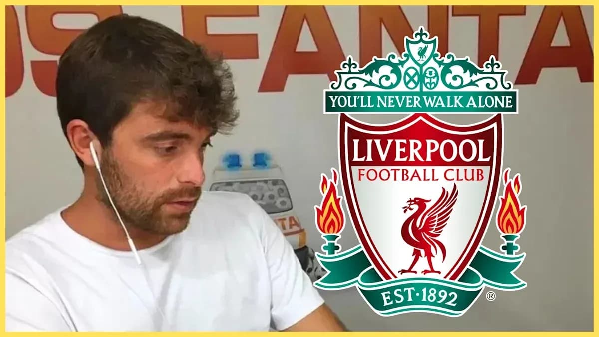 Person wearing headphones with Liverpool FC logo Person wearing headphones with Liverpool FC logo