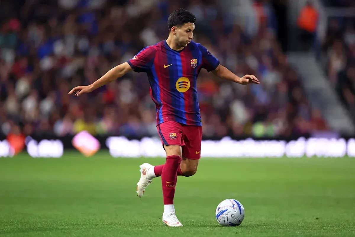 Barcelona player dribbling ball during match Barcelona player dribbling ball during match