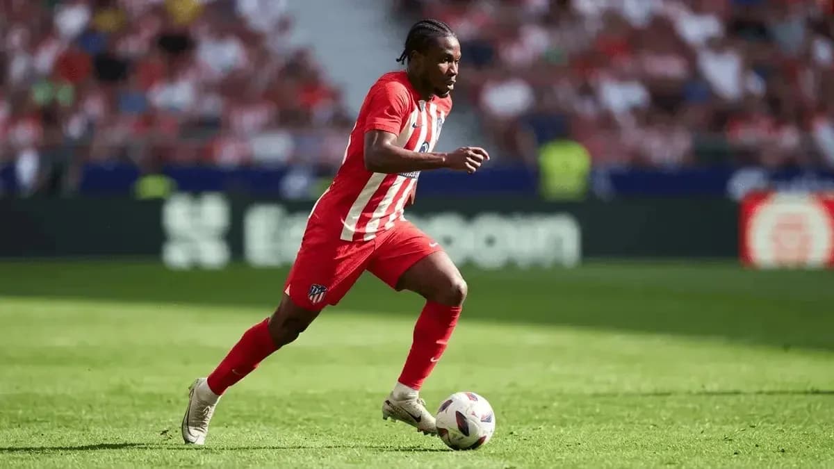 Player dribbling the ball during a match Player dribbling the ball during a match