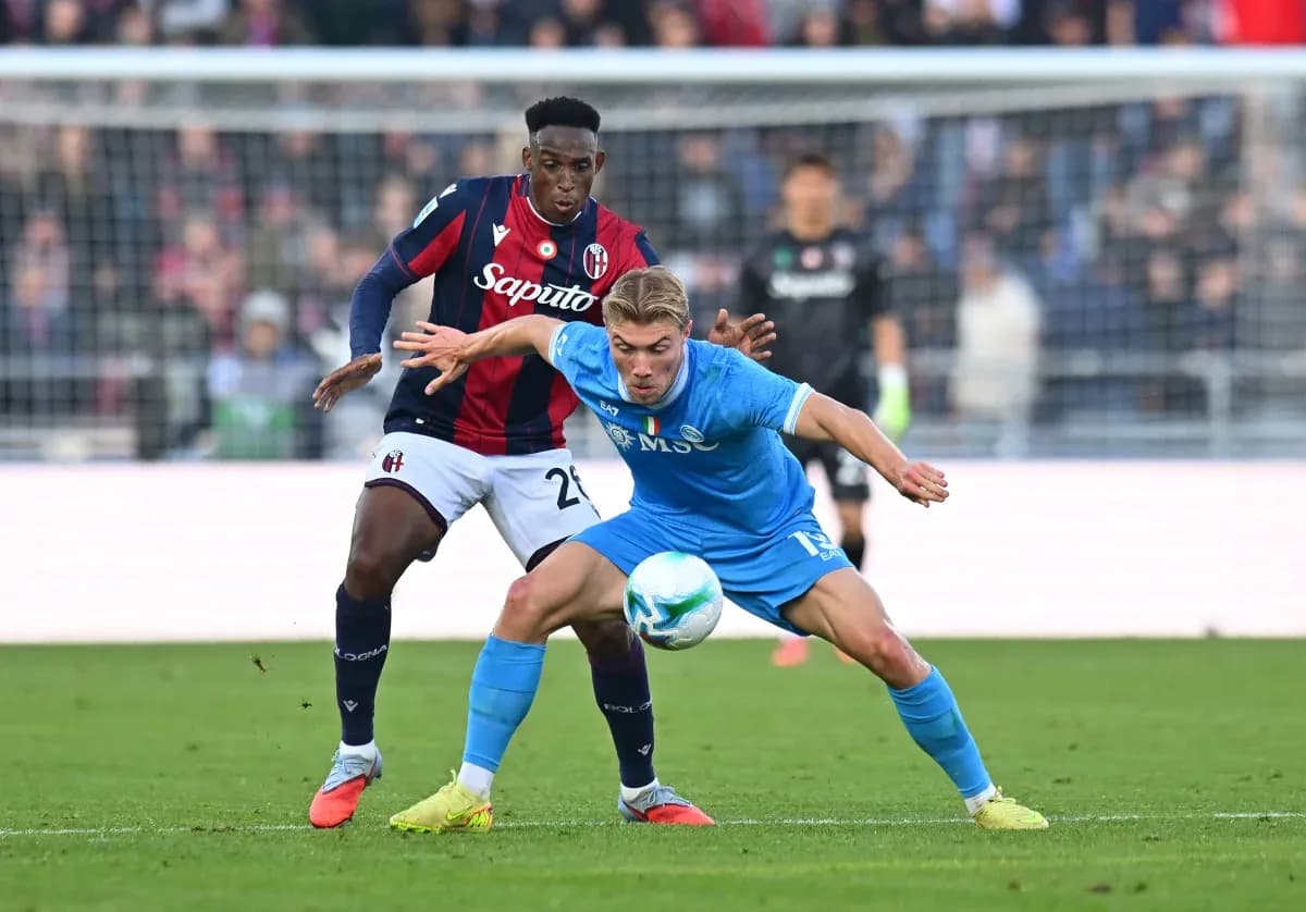Player battling for the ball during Napoli Bologna match Player battling for the ball during Napoli Bologna match
