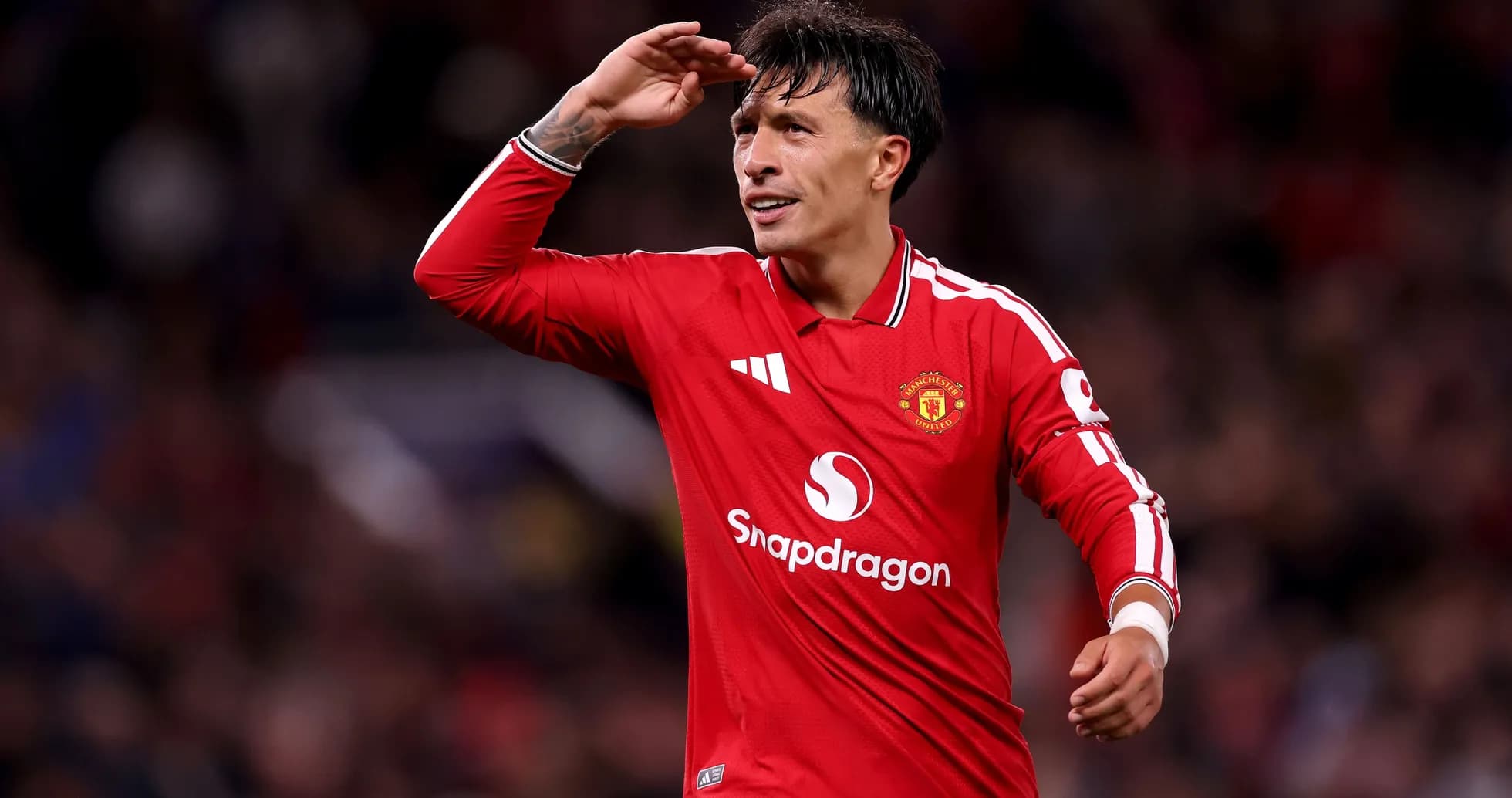 Player saluting fans during Manchester United match Player saluting fans during Manchester United match