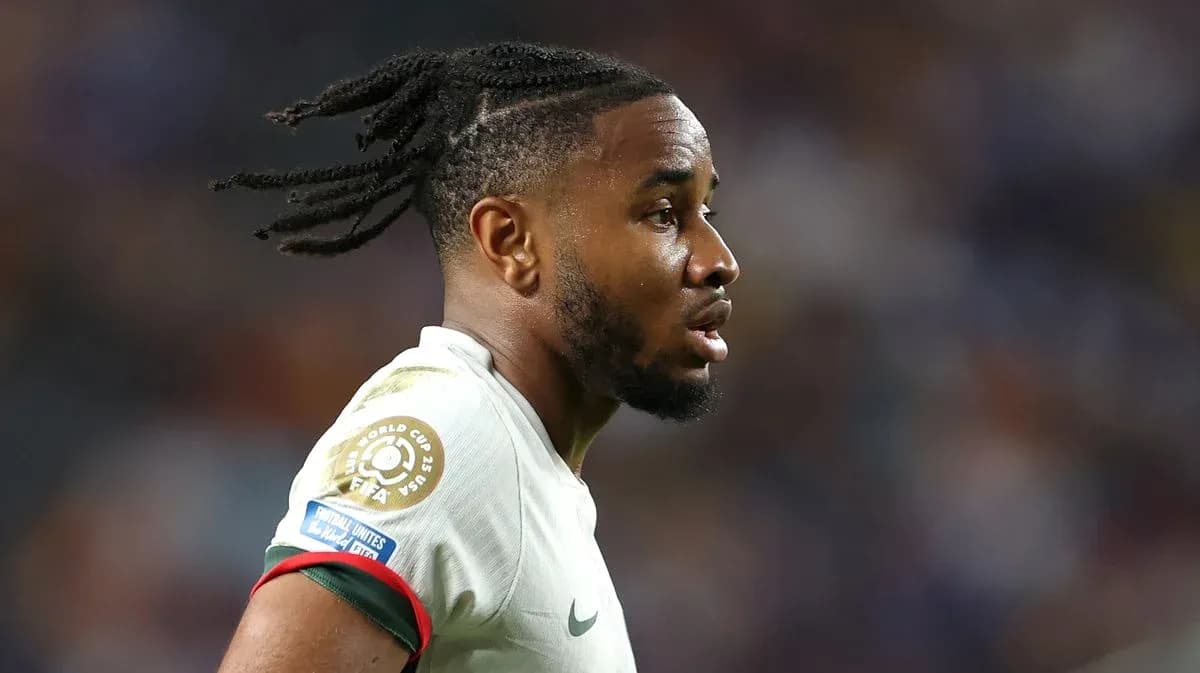 Player in profile during a football match Player in profile during a football match
