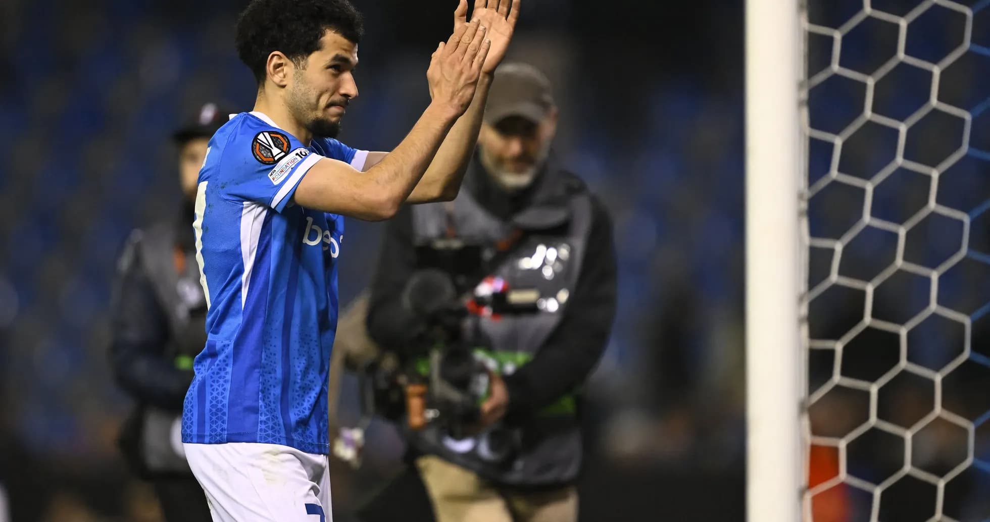 Player applauding fans after match at stadium Player applauding fans after match at stadium