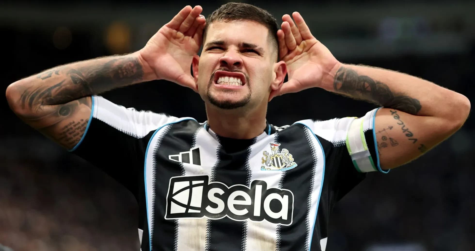 Player celebrating with hands on head during match Player celebrating with hands on head during match