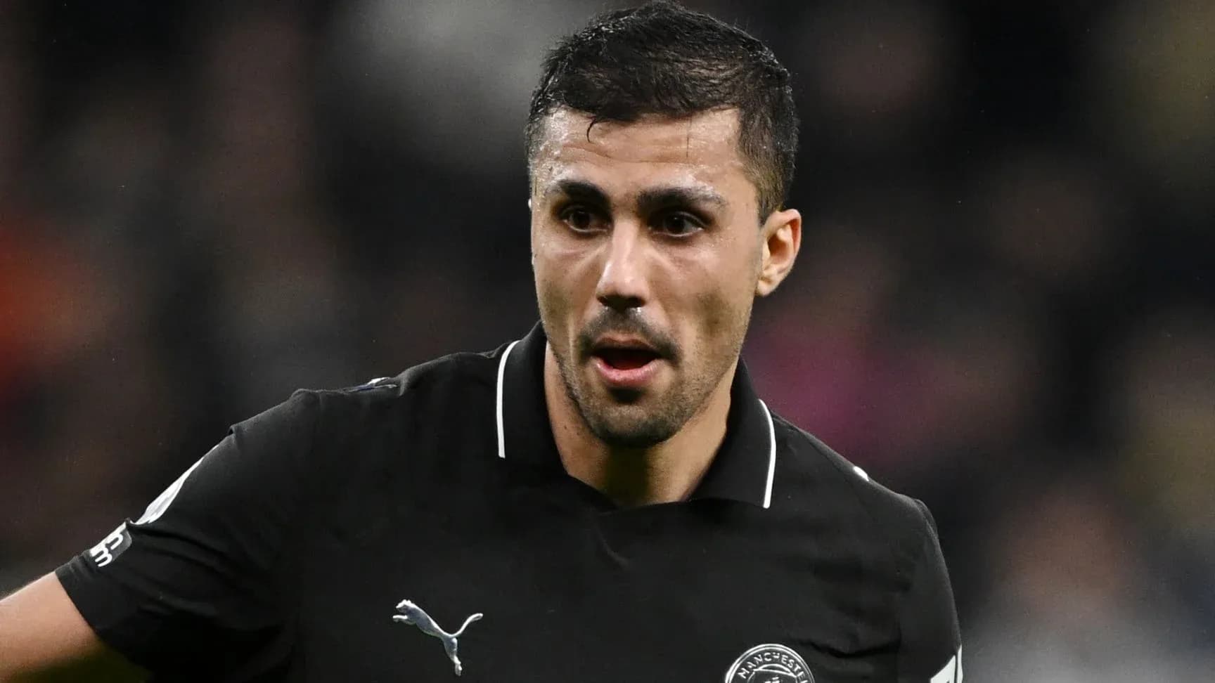 Player wearing black jersey during match action Player wearing black jersey during match action