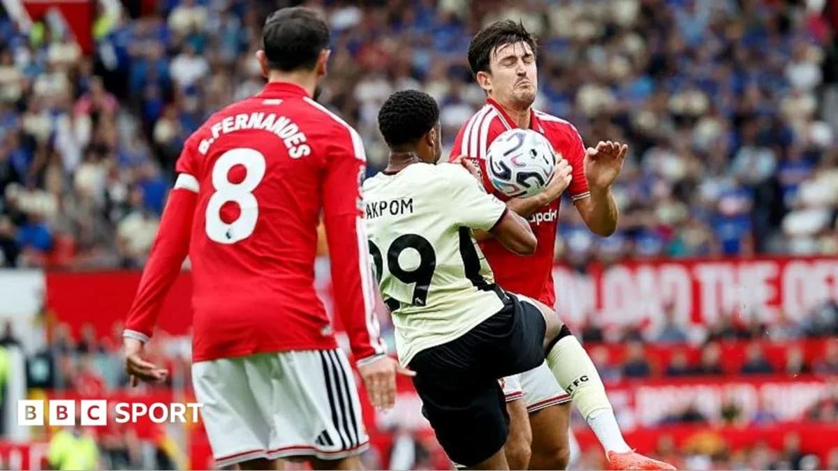 Player attempting to control ball during match Player attempting to control ball during match