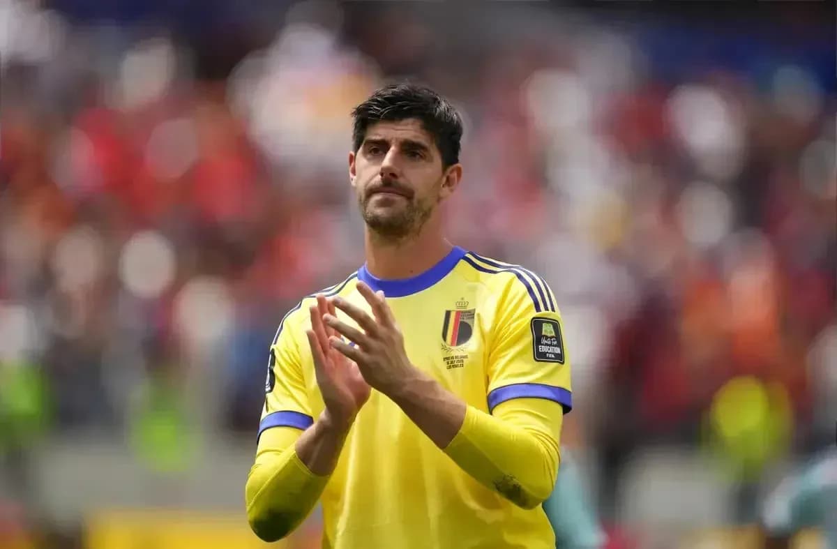 Goalkeeper applauding fans in yellow Belgium jersey Goalkeeper applauding fans in yellow Belgium jersey