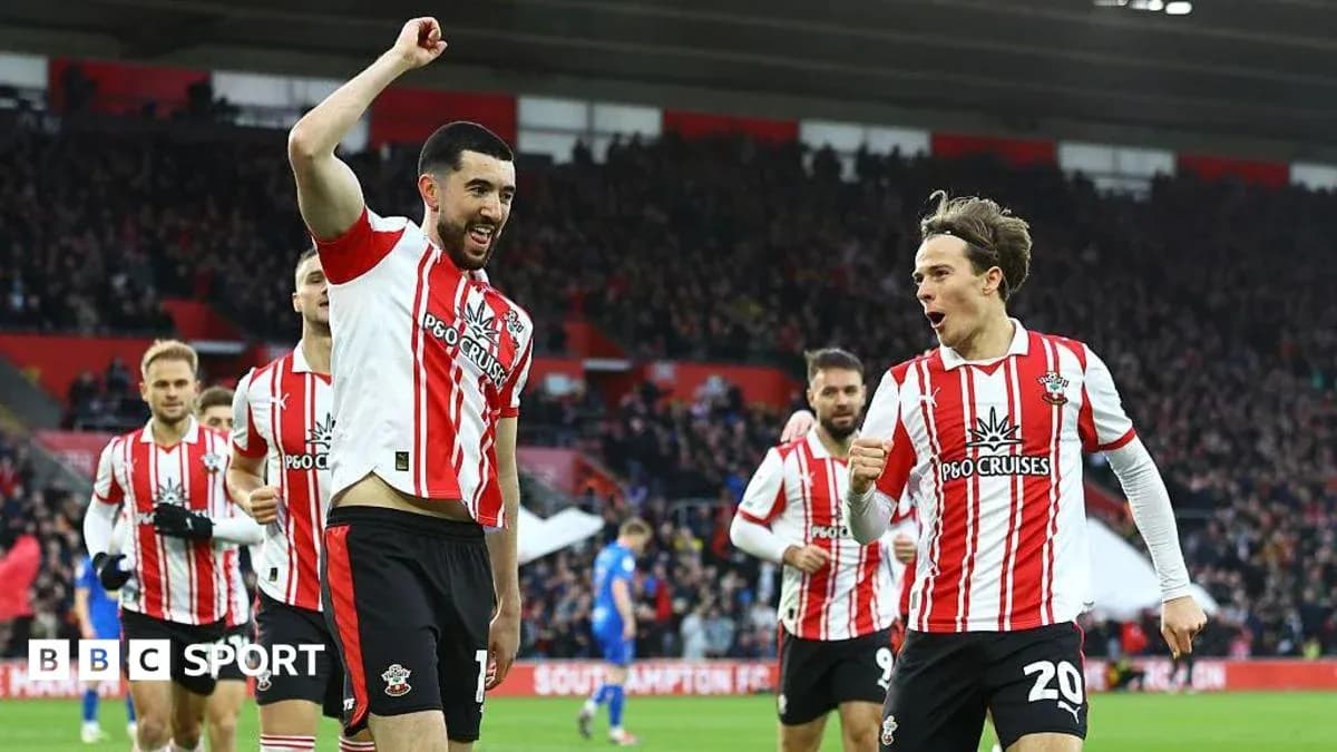 Southampton players celebrating a goal on the pitch Southampton players celebrating a goal on the pitch