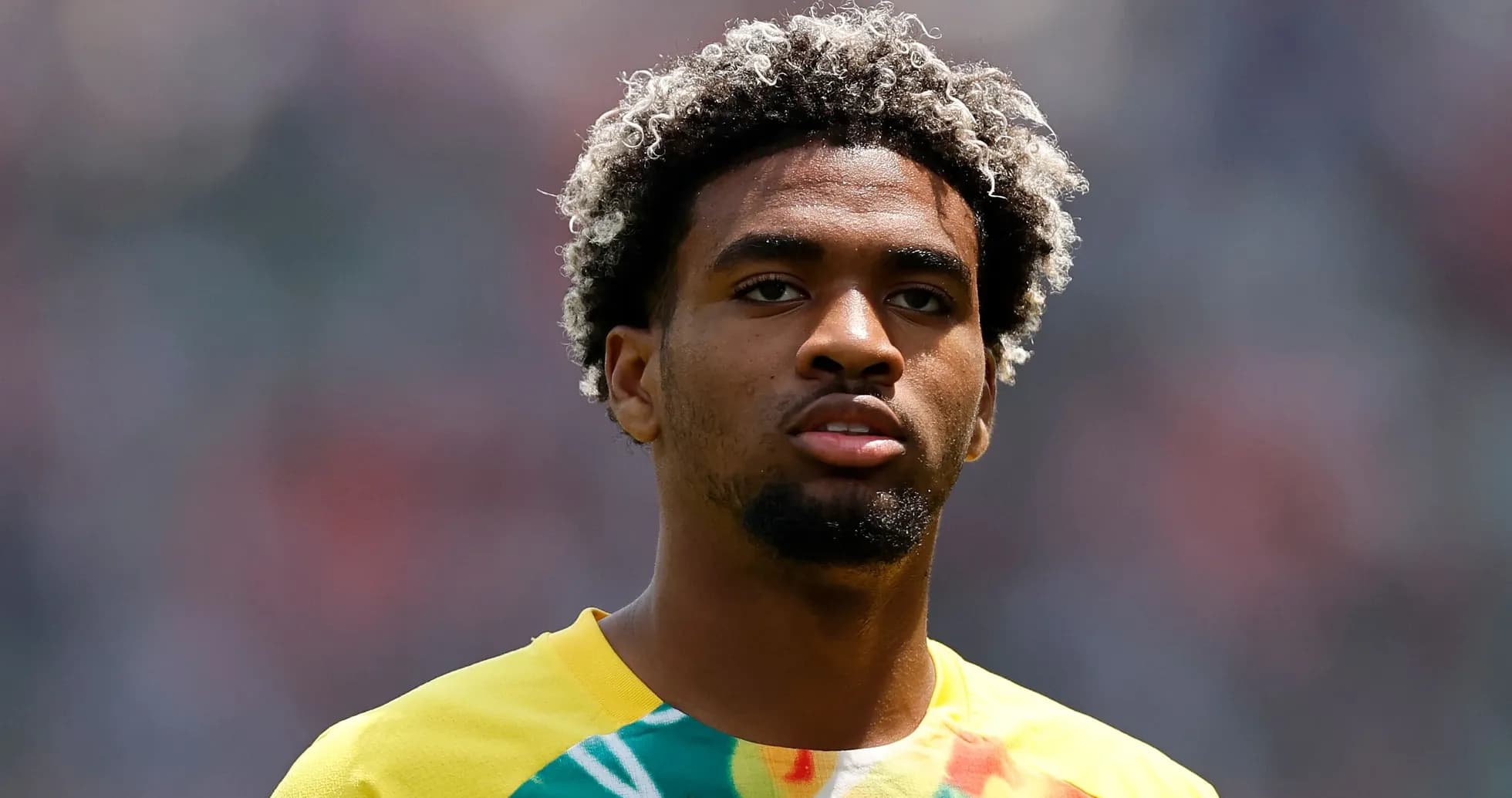 Player wearing a colorful jersey during warm-up Player wearing a colorful jersey during warm-up