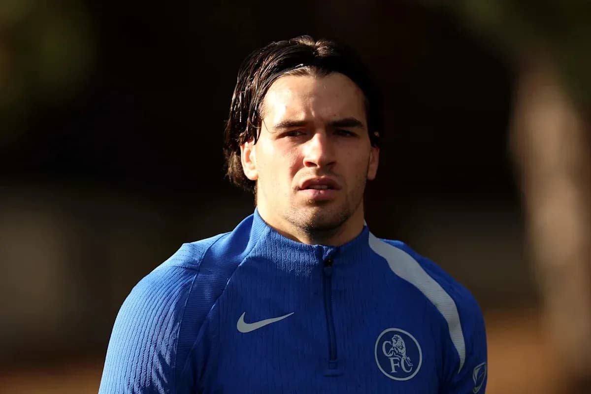 Player in blue training gear at practice session Player in blue training gear at practice session