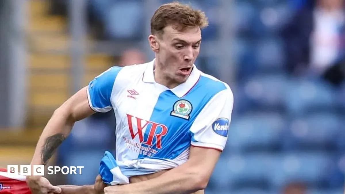 Player in action during match with Blackburn Rovers kit Player in action during match with Blackburn Rovers kit