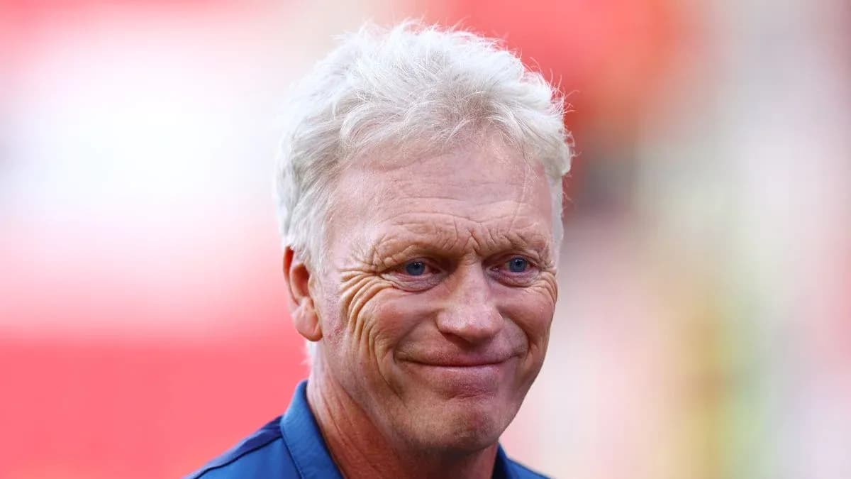 Football manager smiling during pre-match event Football manager smiling during pre-match event
