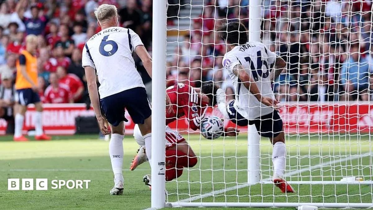 Goalkeeper diving to save a shot on goal Goalkeeper diving to save a shot on goal