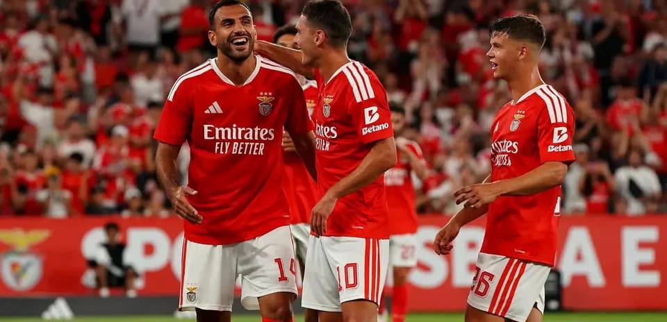 Benfica players celebrating a goal Benfica players celebrating a goal