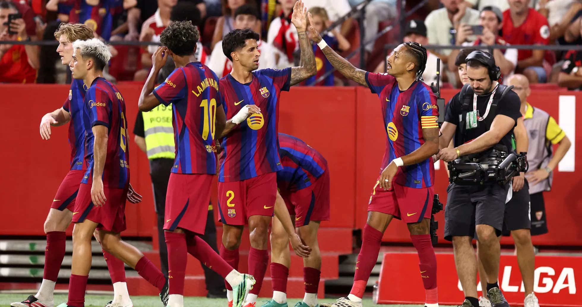 Barcelona players celebrating during a match Barcelona players celebrating during a match