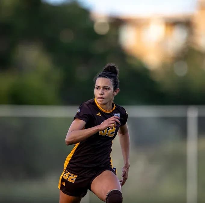 Soccer player in action during a match Soccer player in action during a match