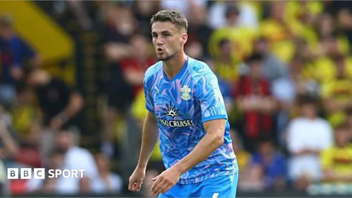Player in blue jersey during football match Player in blue jersey during football match