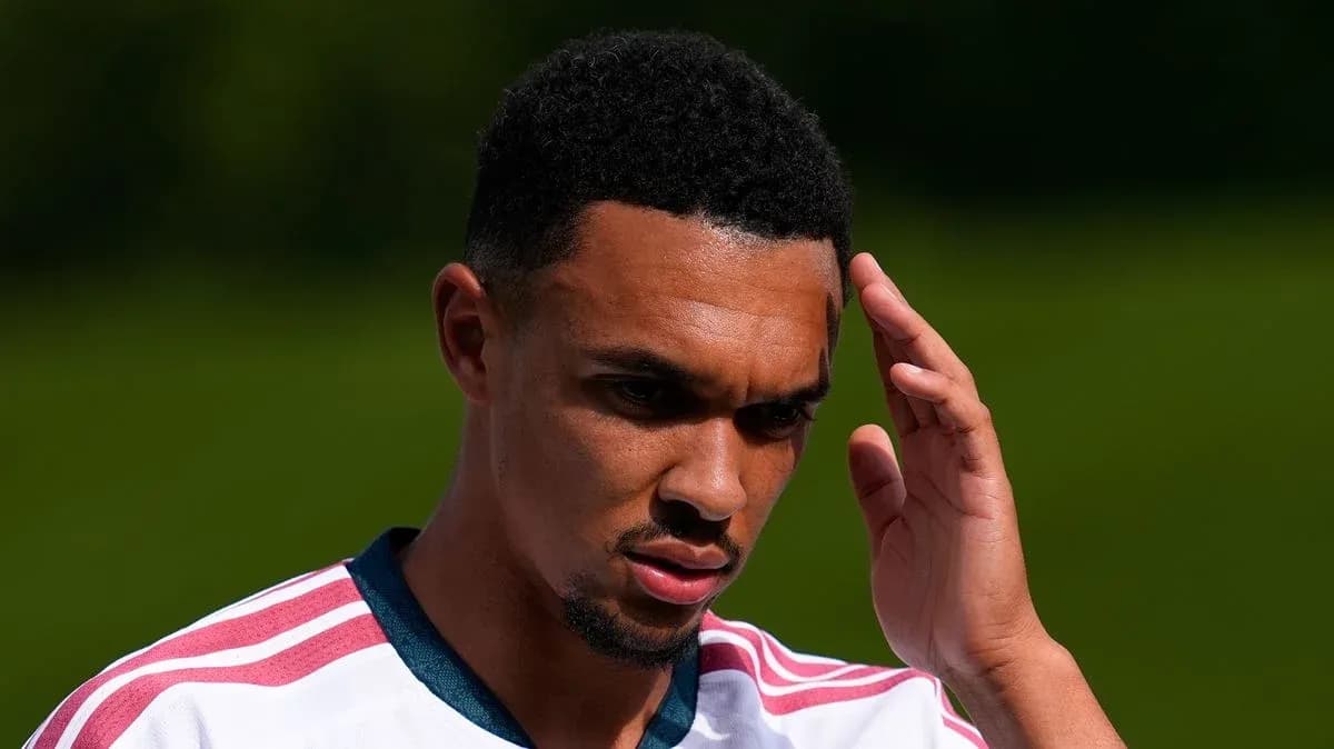 Player touching his forehead during training session Player touching his forehead during training session