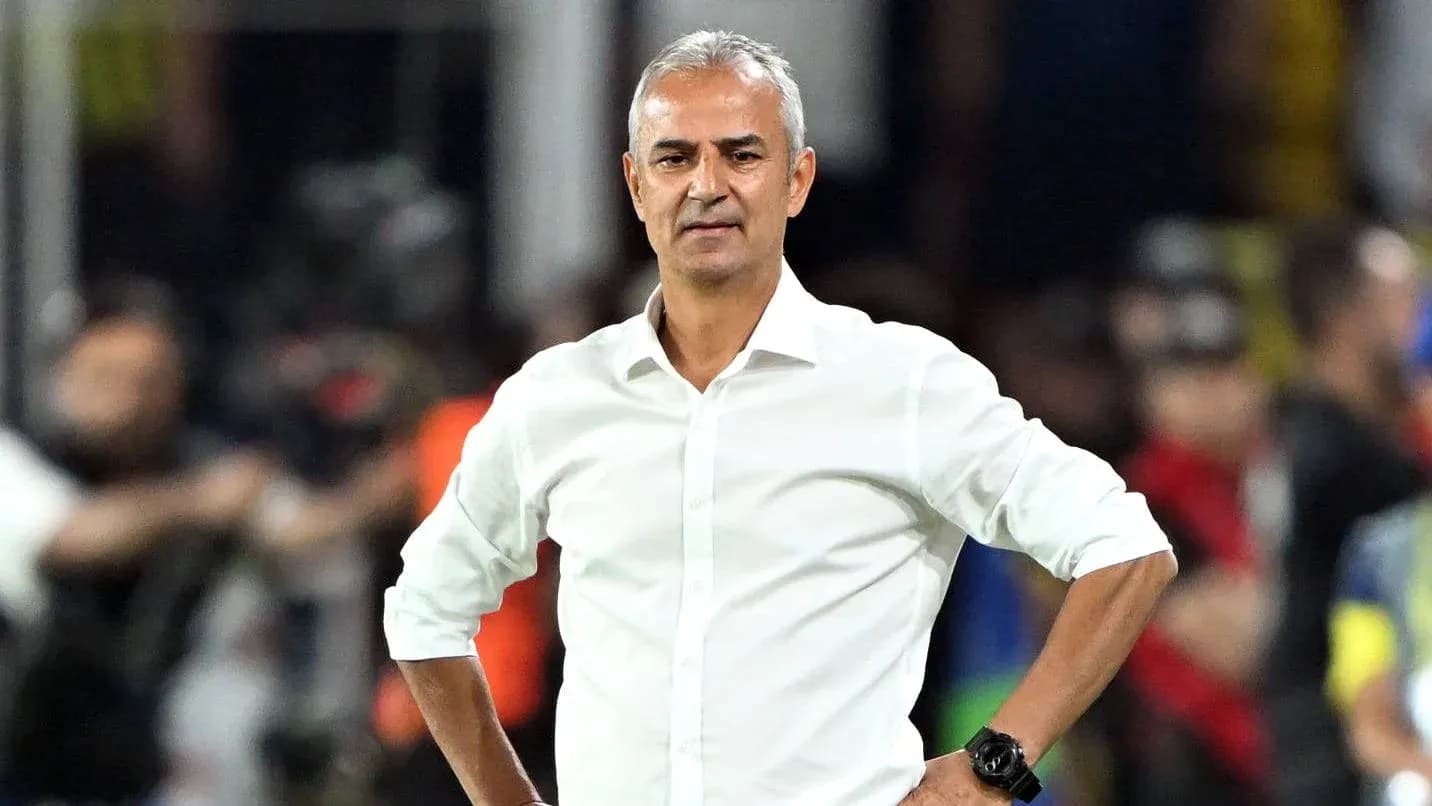 Coach standing on the sidelines during a match Coach standing on the sidelines during a match