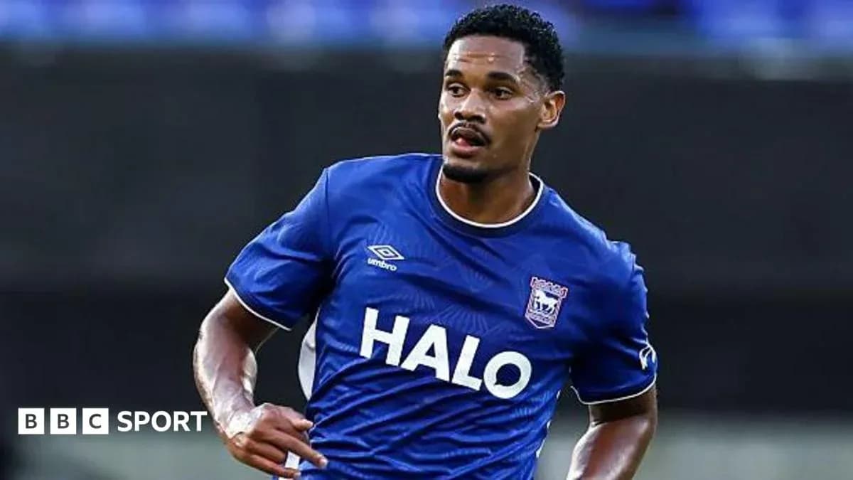 Player wearing blue jersey running on the field Player wearing blue jersey running on the field
