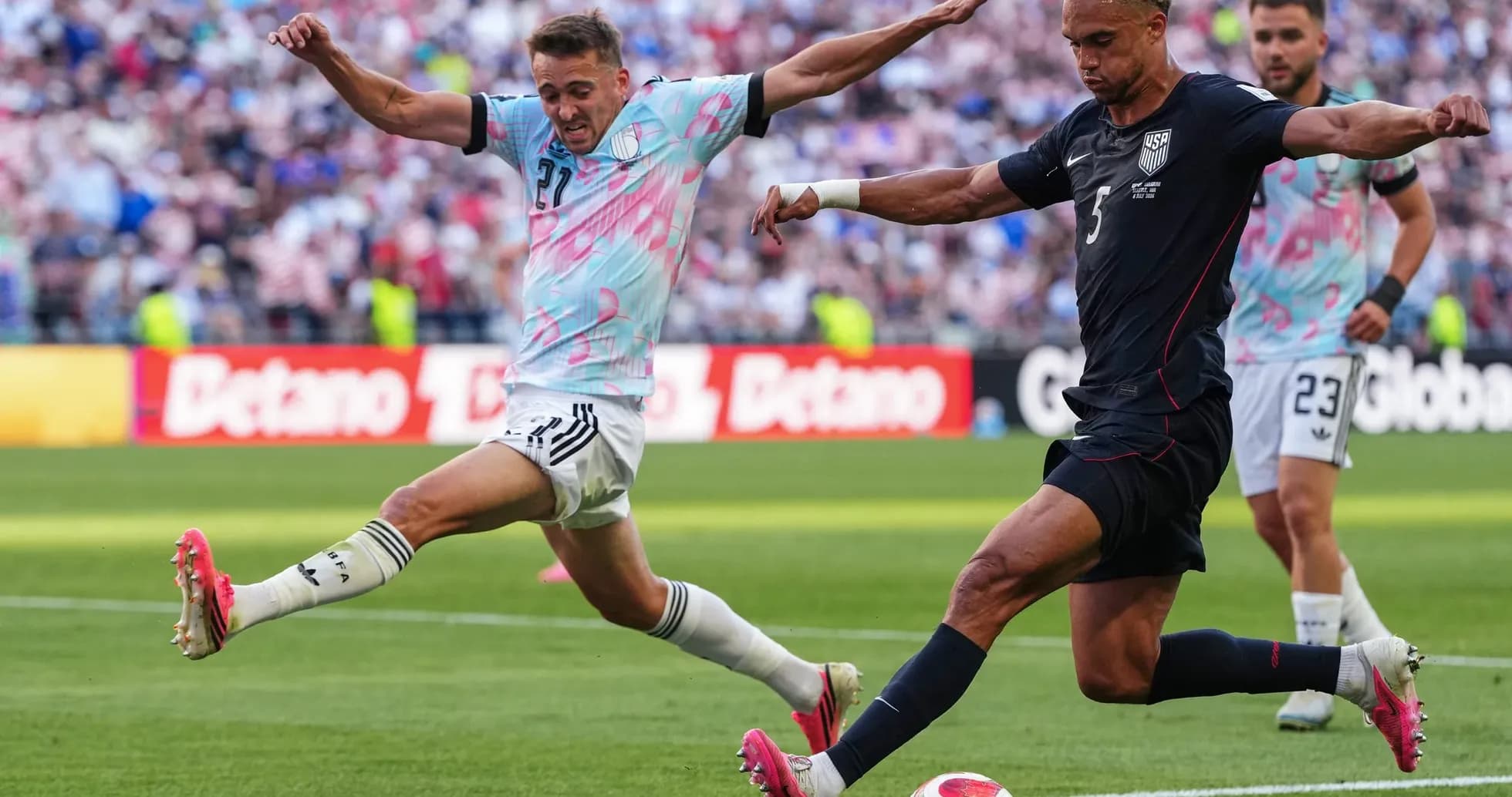 Player tackling during USA vs Belgium match Player tackling during USA vs Belgium match
