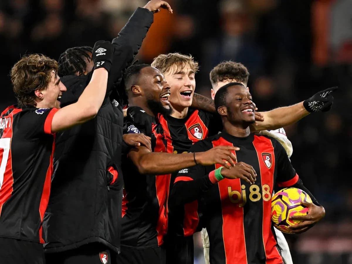 Bournemouth players celebrating a goal in match Bournemouth players celebrating a goal in match