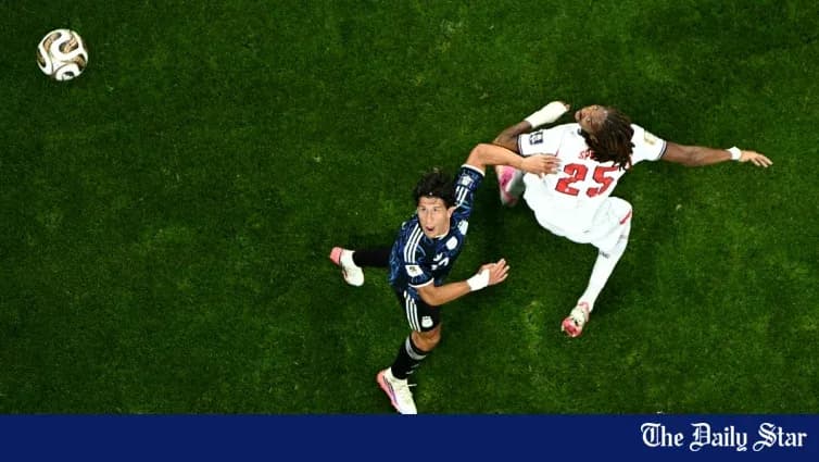 Two players contesting for the ball during match Two players contesting for the ball during match