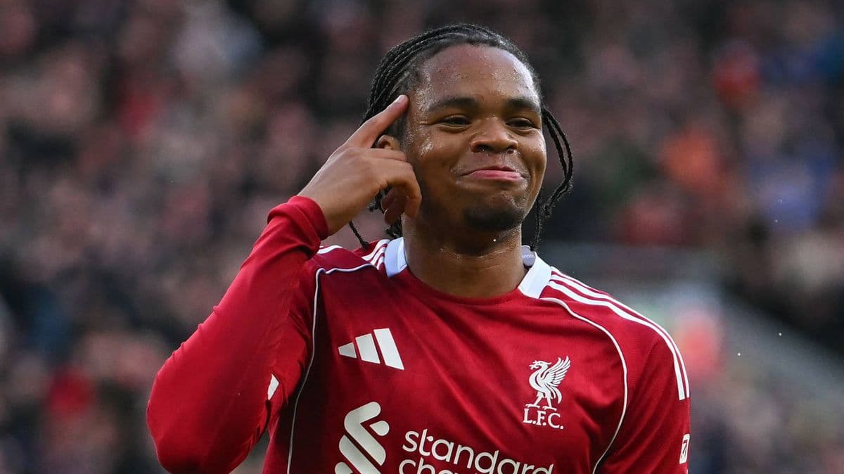 Player celebrating a goal with a gesture Player celebrating a goal with a gesture