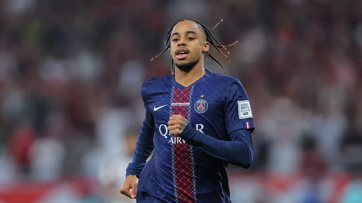 Player running on field in Paris Saint-Germain kit Player running on field in Paris Saint-Germain kit