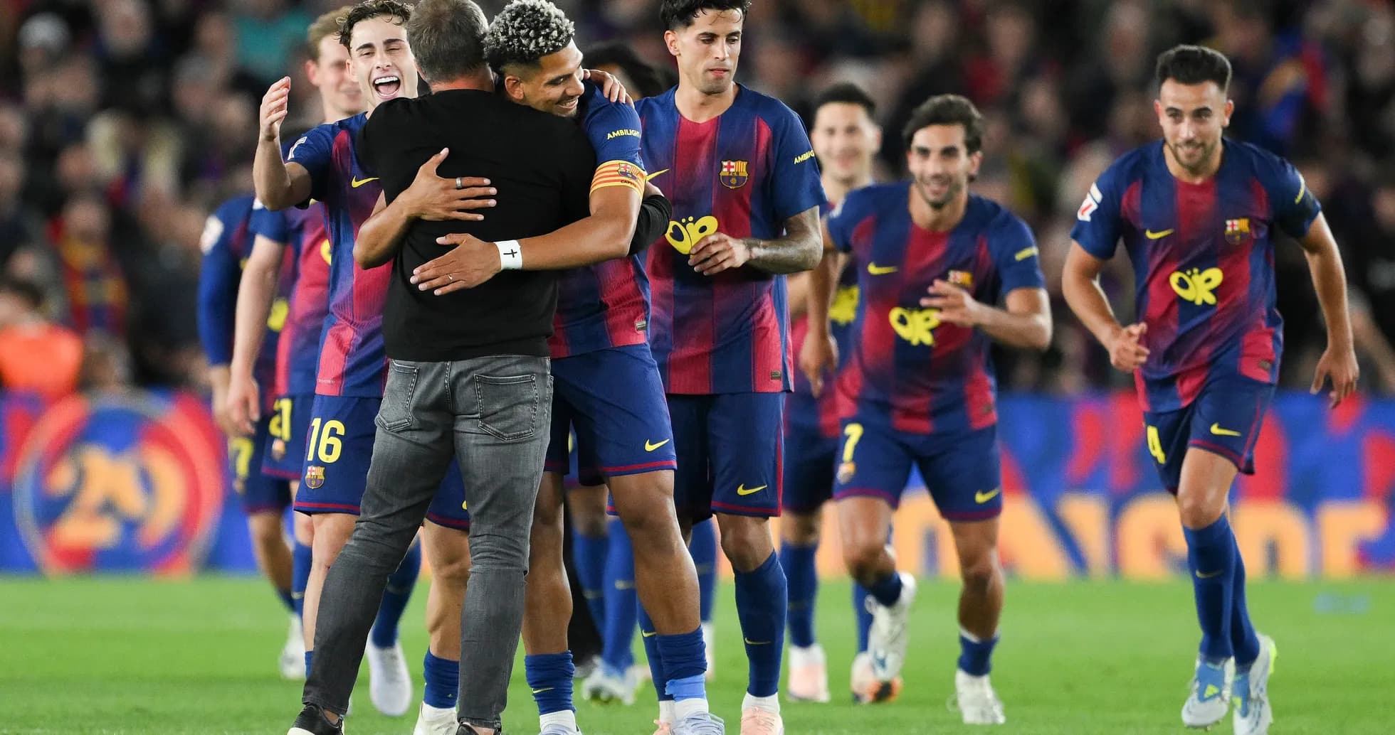 Barcelona players celebrating with the coach after victory Barcelona players celebrating with the coach after victory