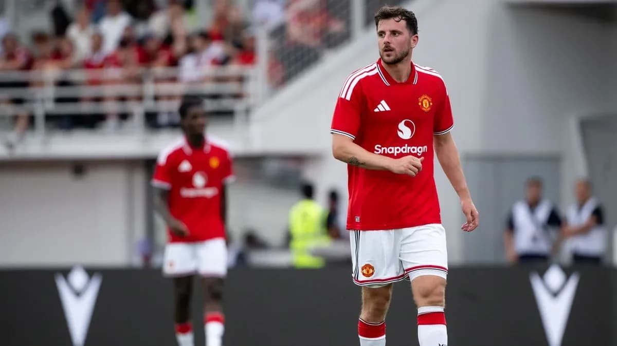 Player walking on pitch during Manchester United match Player walking on pitch during Manchester United match