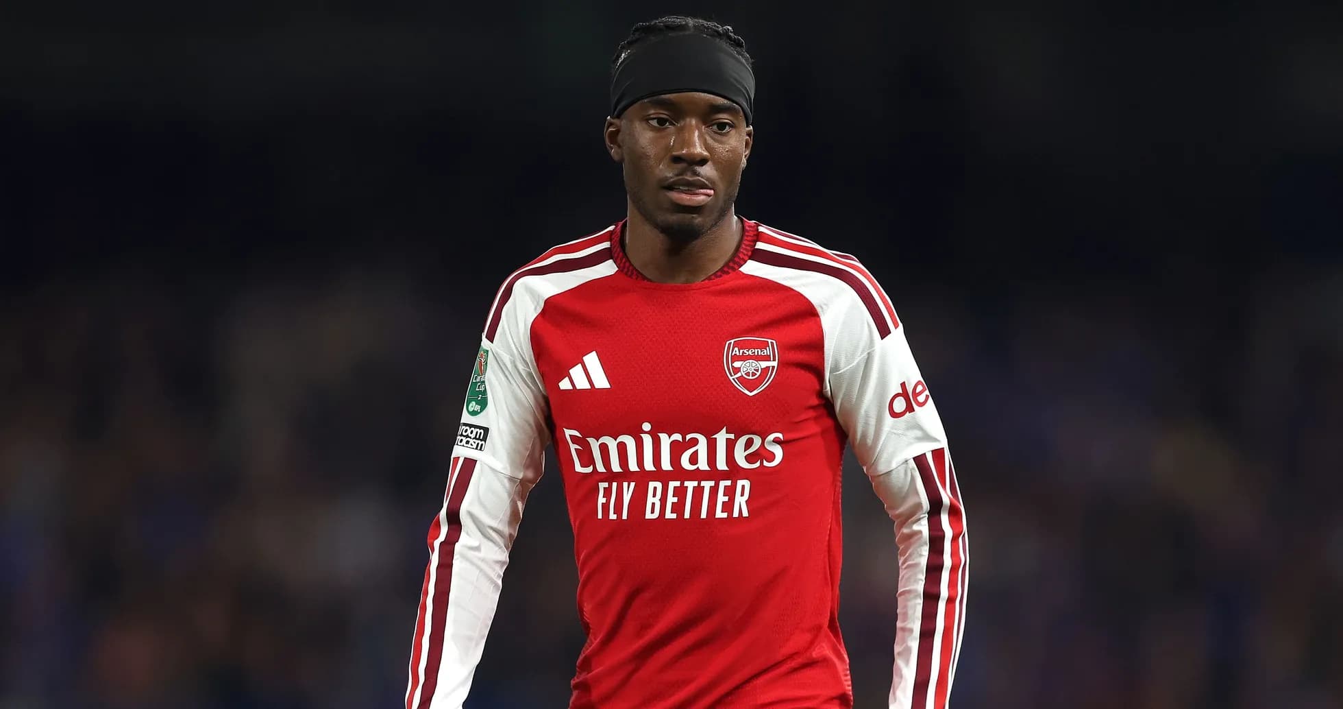 Player wearing Arsenal jersey during match action Player wearing Arsenal jersey during match action