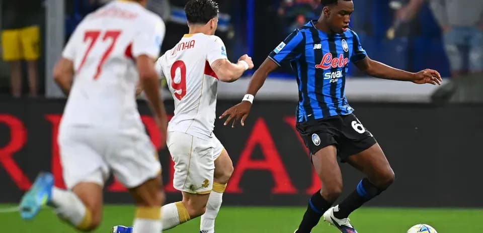 Player dribbling the ball during Serie A match Player dribbling the ball during Serie A match
