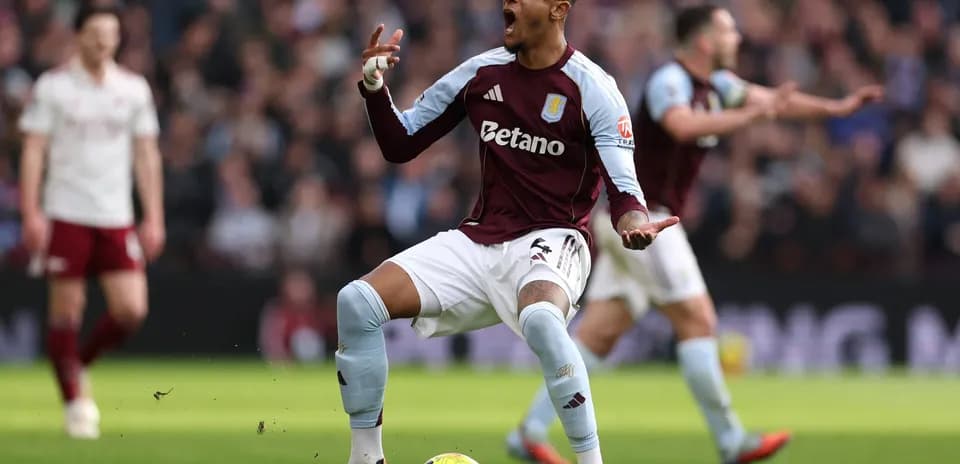 Aston Villa player celebrating during match Aston Villa player celebrating during match
