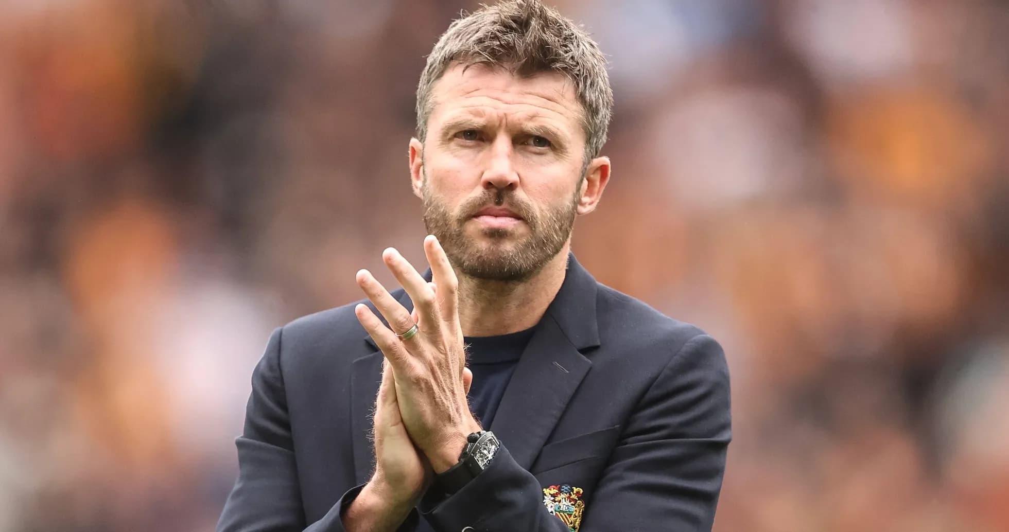 Coach clapping hands during match on sidelines Coach clapping hands during match on sidelines