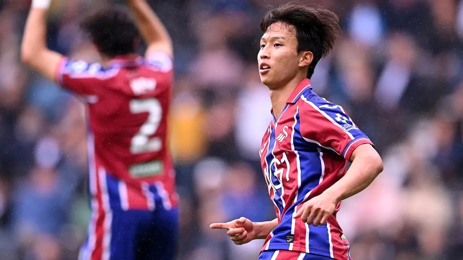 Player celebrating after scoring a goal during match Player celebrating after scoring a goal during match