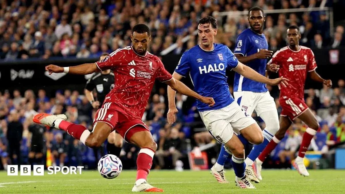 Liverpool player kicking ball during match against Ipswich Liverpool player kicking ball during match against Ipswich