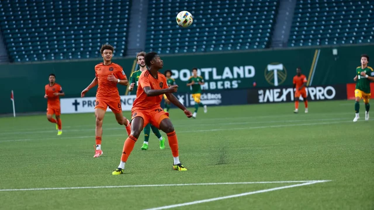 Players competing for the ball during MLS Next Pro match Players competing for the ball during MLS Next Pro match