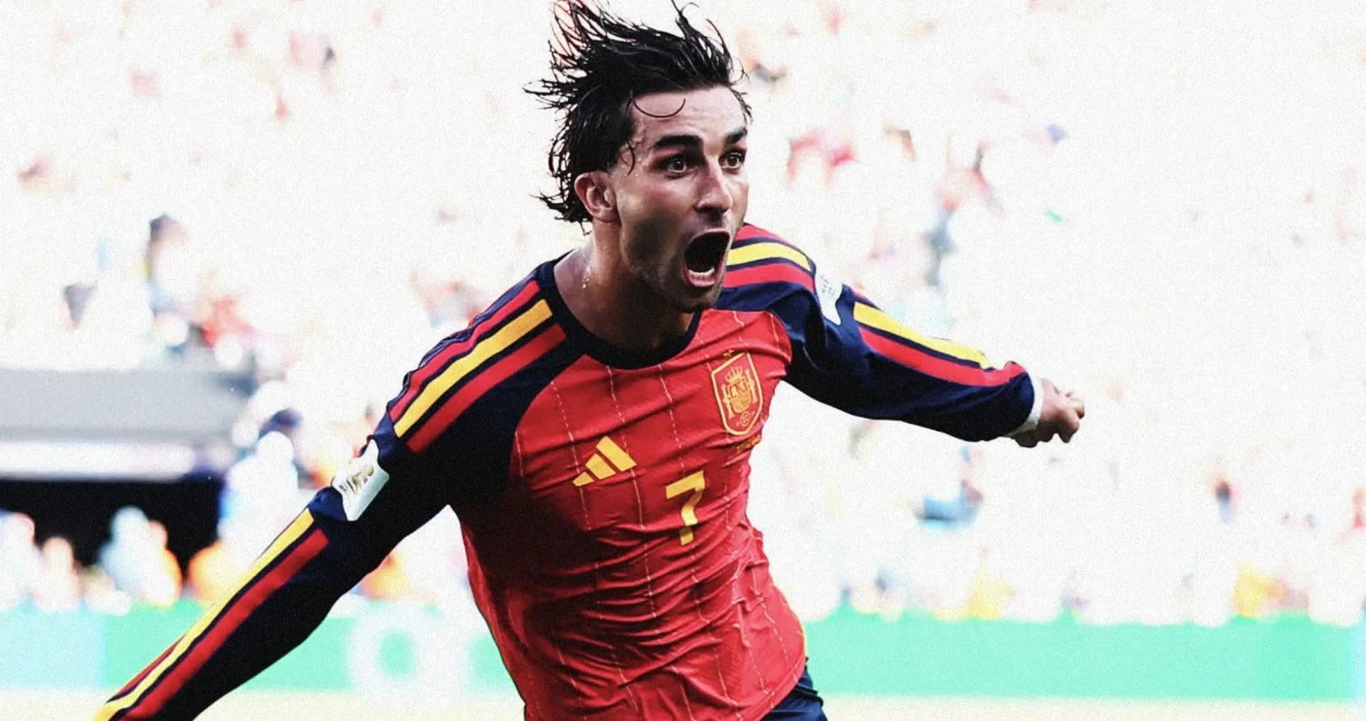 Player celebrating after scoring for Spain Player celebrating after scoring for Spain
