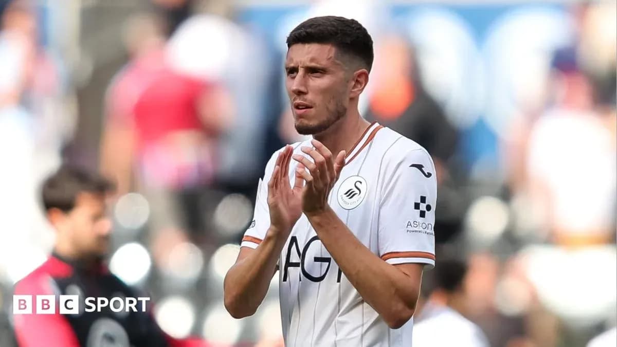 Player applauding fans during match at stadium Player applauding fans during match at stadium