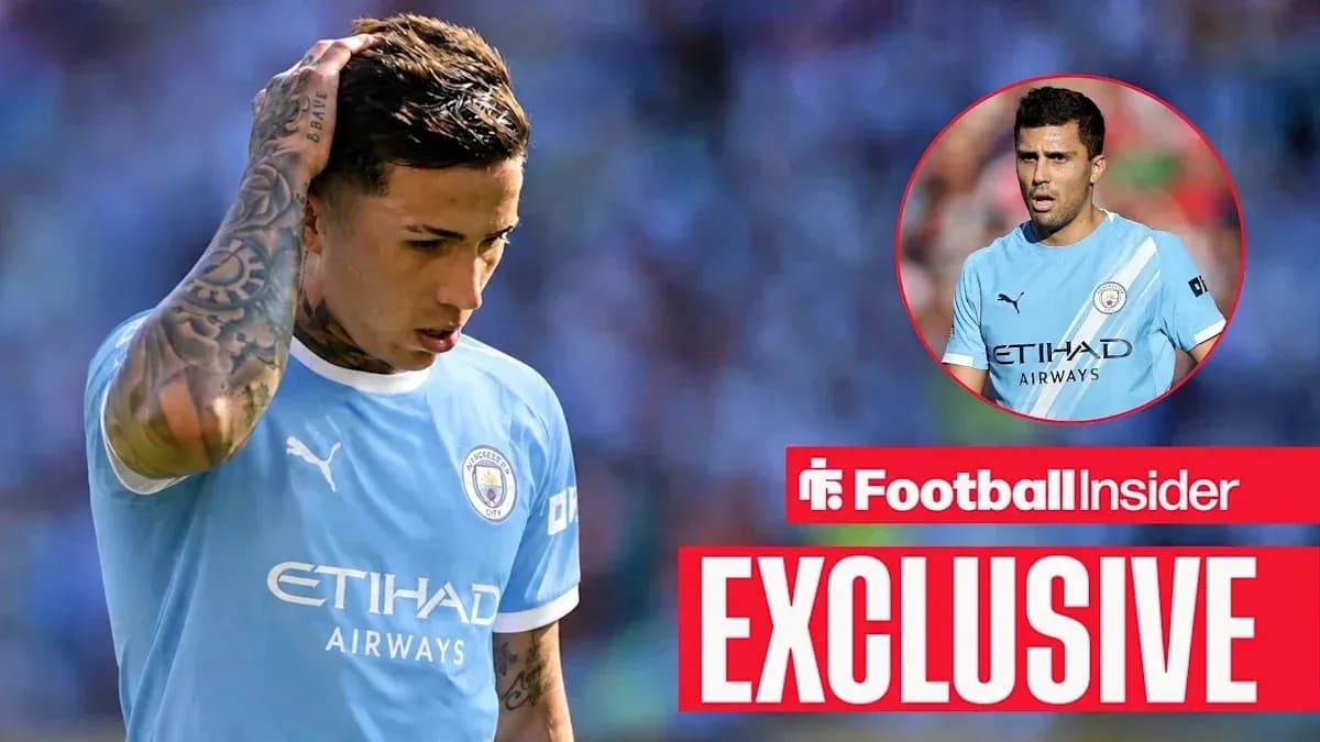 Football player in Manchester City kit looking down Football player in Manchester City kit looking down