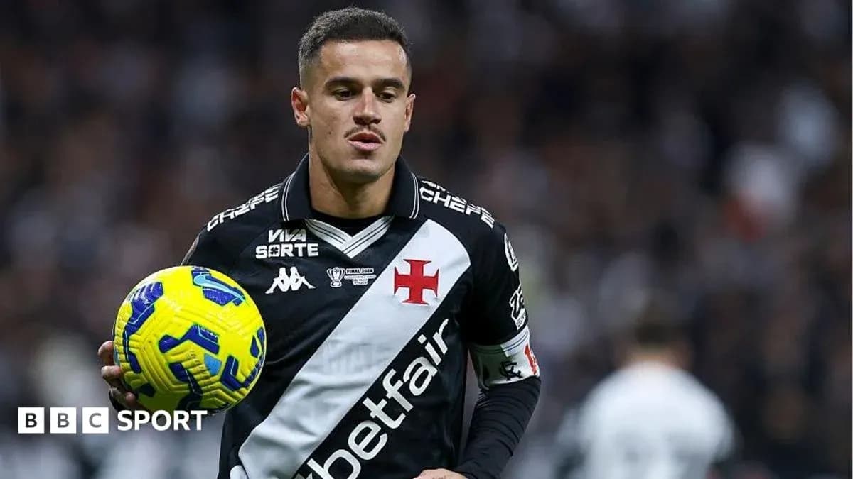 Player holding a ball during a football match Player holding a ball during a football match