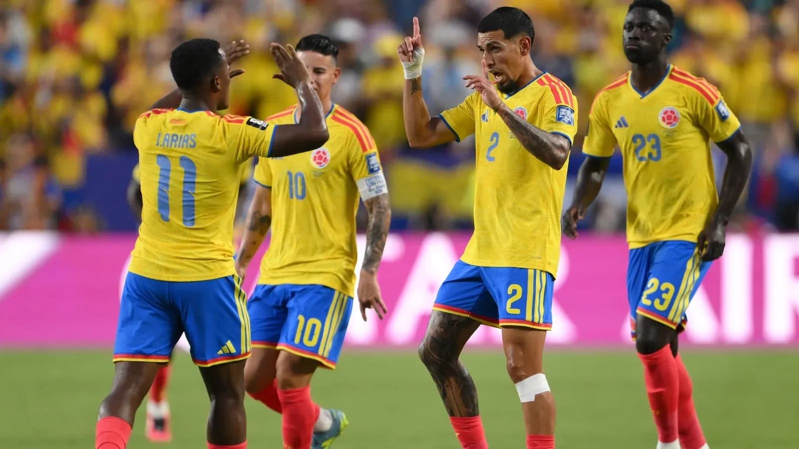 Colombian players celebrating during a match Colombian players celebrating during a match