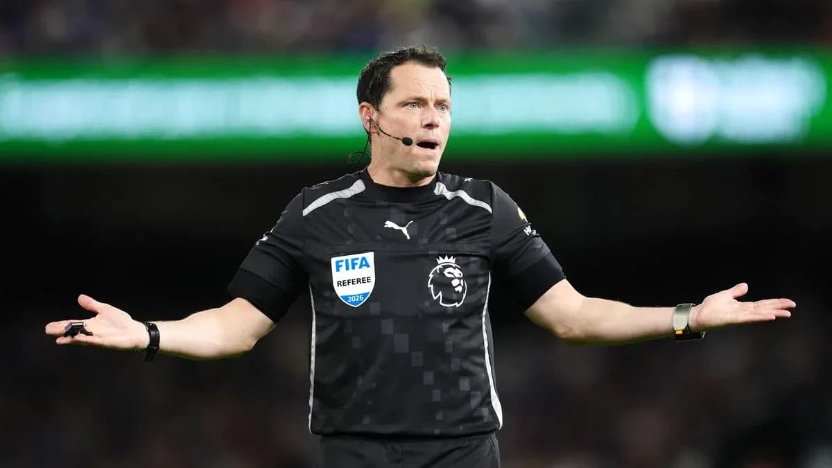 Referee gesturing during a football match Referee gesturing during a football match