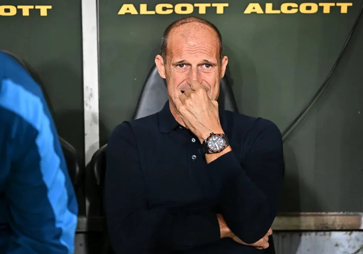 Coach seated on bench during a match Coach seated on bench during a match